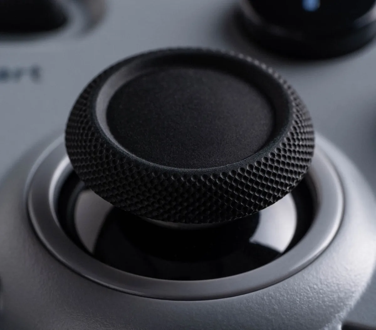 Close-up of an 8BitDo Pro 3 TMR joystick