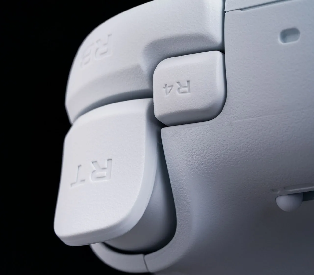 Side view of the right trigger, bumper and R4 button