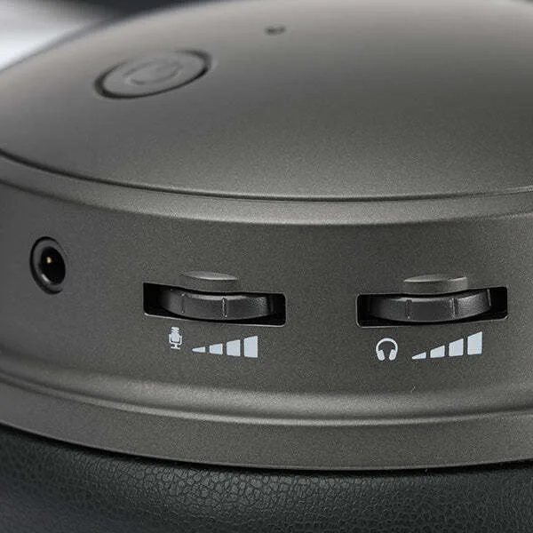 Close-up of the Audeze Maxwell earcup controls: multi-function button, headphone jack and two volume wheels