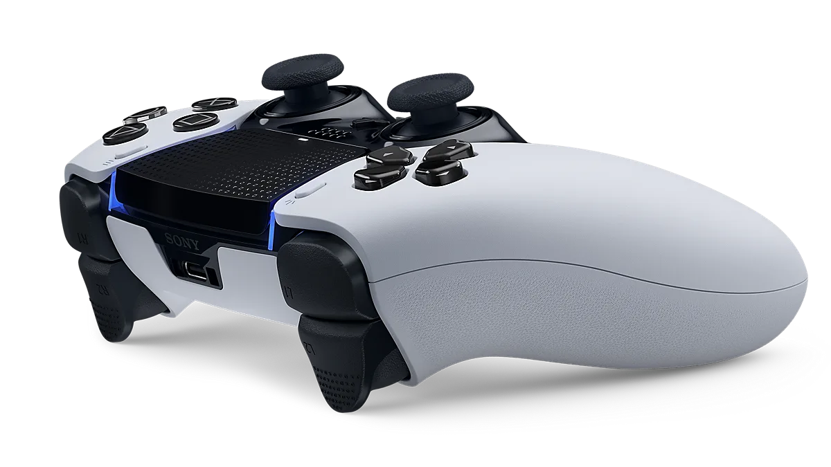 DualSense Edge angled view showing textured triggers and a replaceable thumbstick