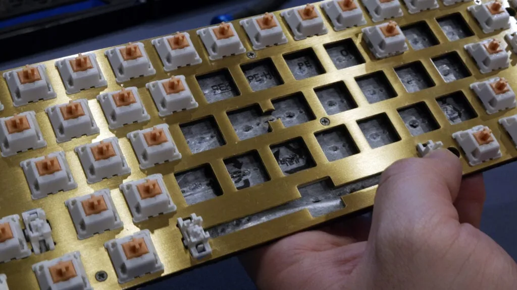 Pressing switches back into the plate and PCB over the PE foam layer