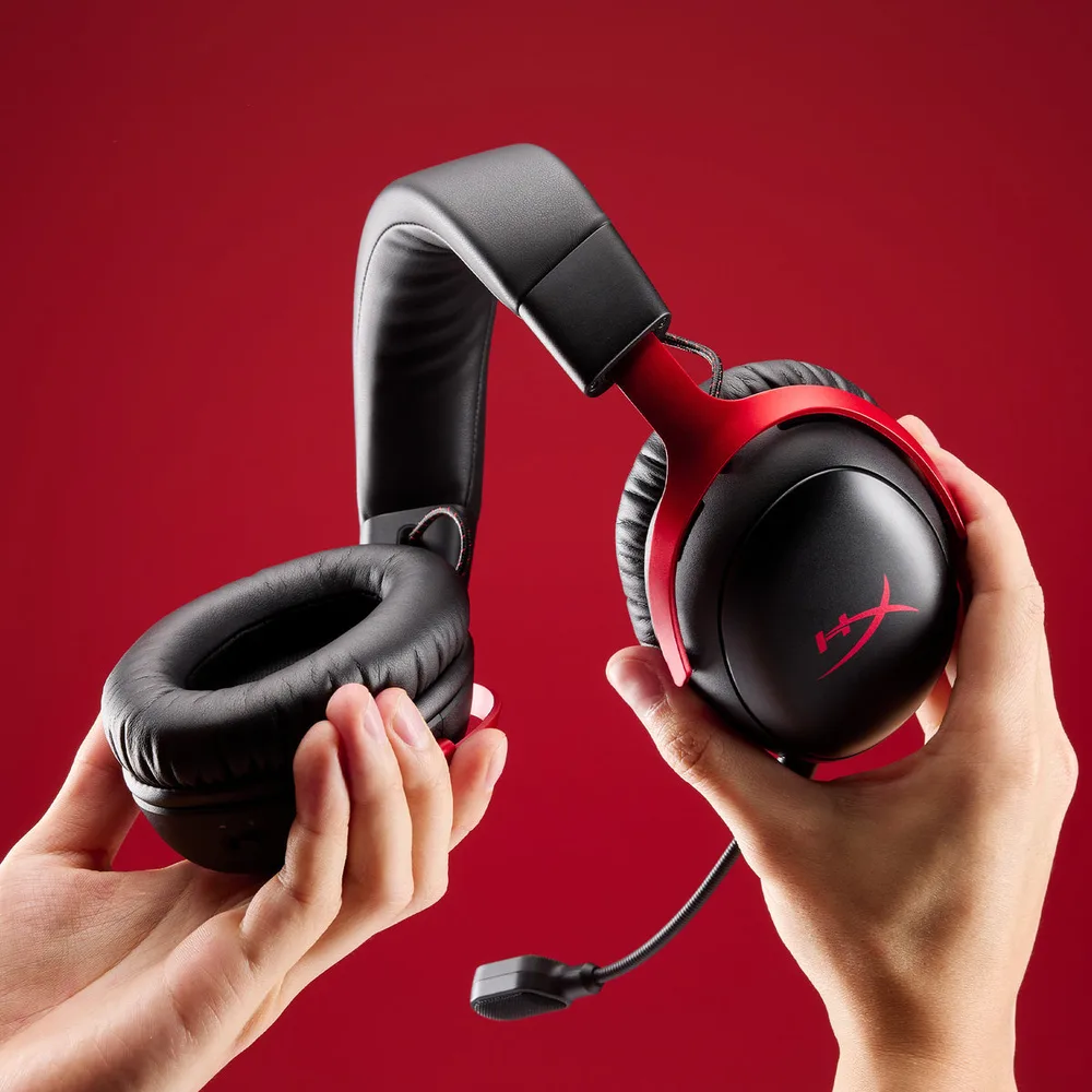 Hands flexing the HyperX Cloud III S Wireless headband