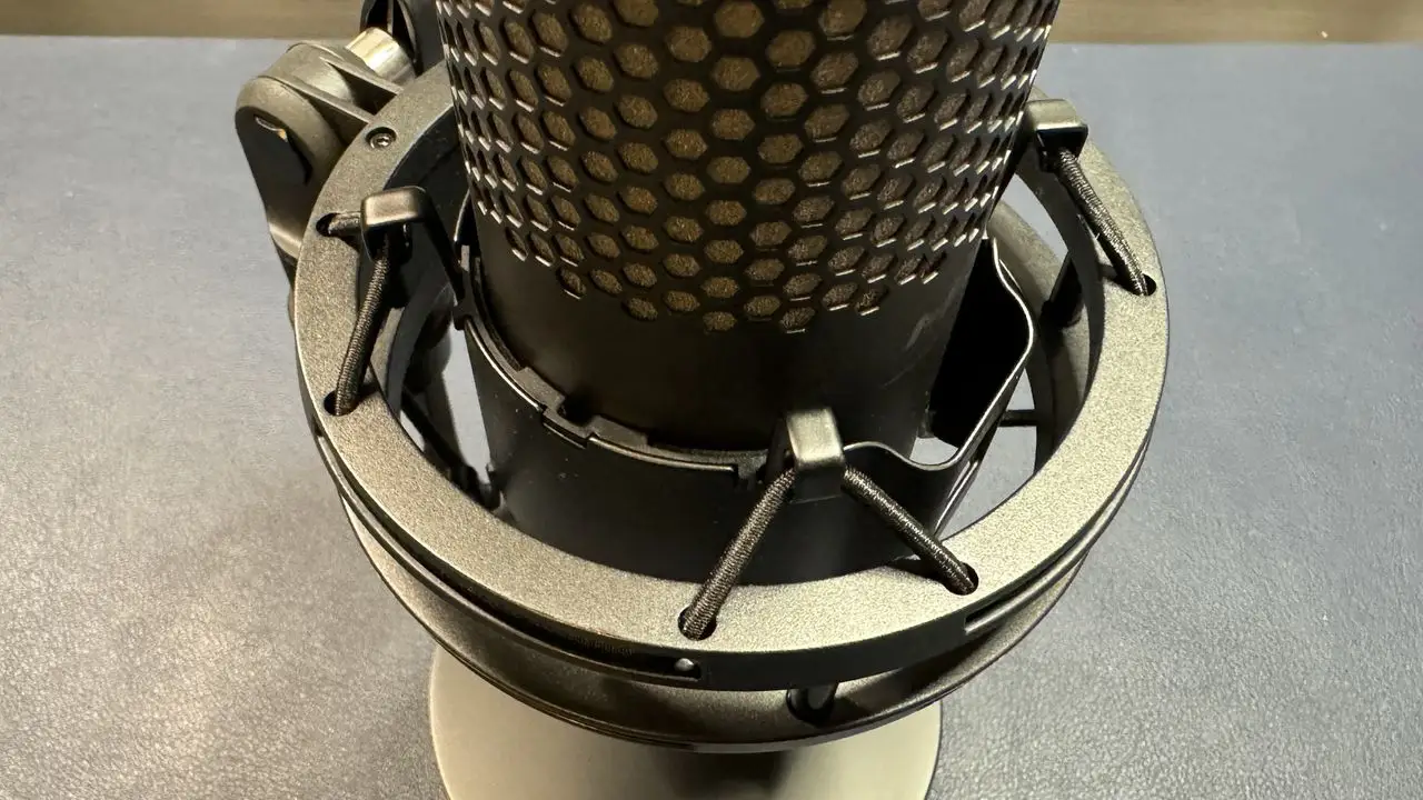 QuadCast 2 S microphone in its spring-loaded shock mount