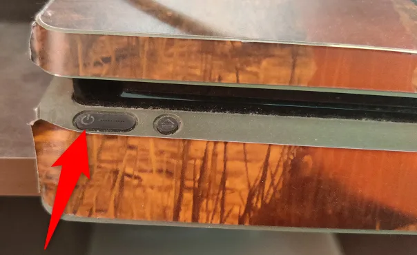 Power button on the front of a PS4 console