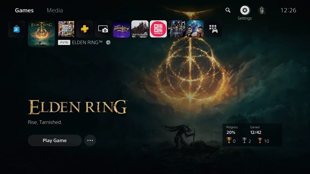 Settings gear icon in the top right corner of the PS5 home screen