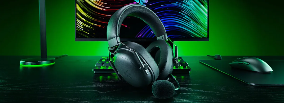 Razer BlackShark V3 with HyperClear Super Wideband mic on a gaming desk