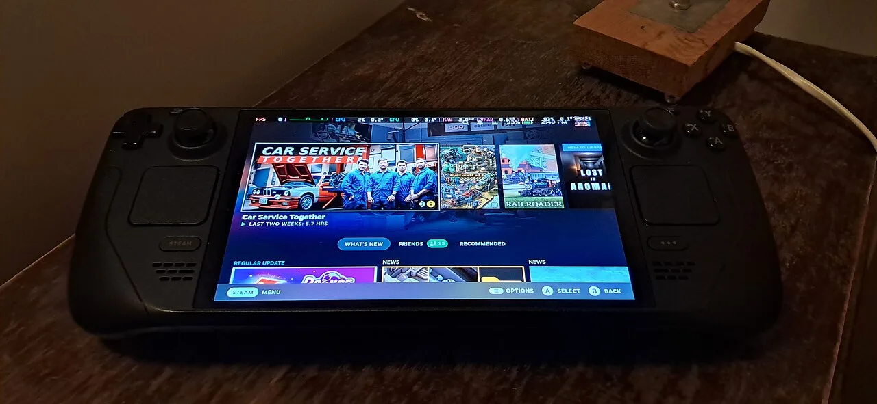 Steam Deck OLED handheld showing the Steam home screen
