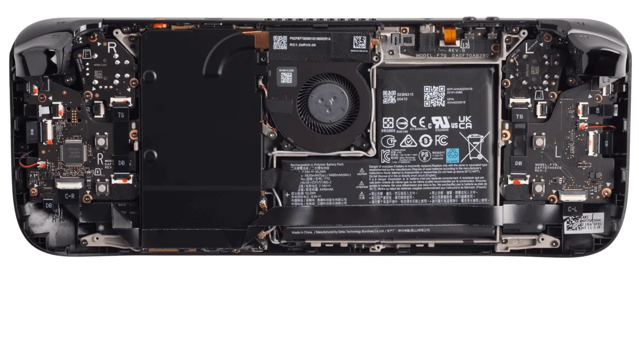 Steam Deck OLED opened up showing the battery, fan and mainboard