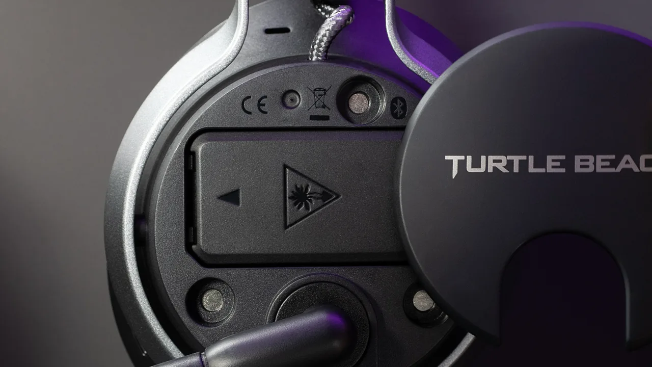Close-up of the open battery compartment on a Turtle Beach Stealth Pro earcup