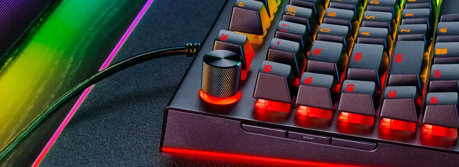 Razer BlackWidow V4 Pro left edge showing the Command Dial, M1 to M5 macro keys and three side buttons