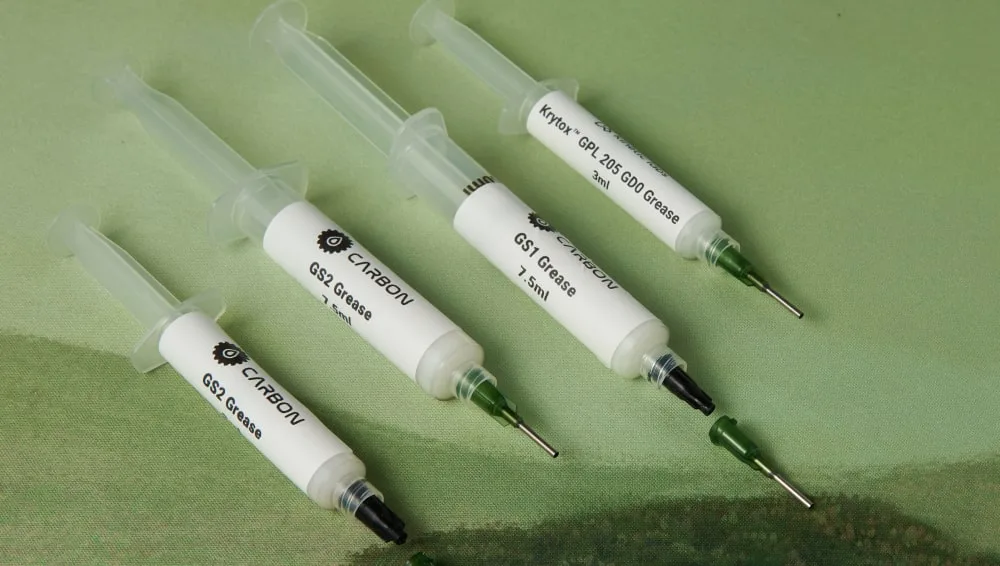 Syringes of Carbon GS1, Carbon GS2 and Krytox GPL 205 GD0 switch lube
