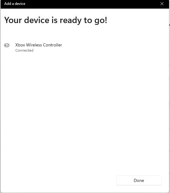 Windows Add a device window saying Your device is ready to go with Xbox Wireless Controller connected
